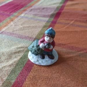 Ceramic Child Carrying Tree Christmas Winter Village Figurine
